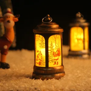 Vintage Christmas lantern hanging ornament with warm LED light and Santa Claus pattern