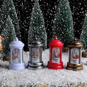 Set of 4 decorative Christmas lanterns featuring Santa and reindeer designs on snow background