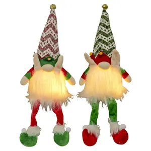 Handmade plush Christmas gnomes with LED glowing beards and festive pointed hats