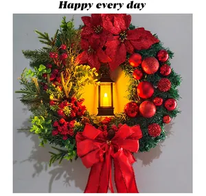 Ghirlanda natalizia festosa con lanterna LED fiori di stella di Natale e fiocco rosso