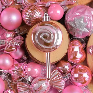 Festive pink Christmas ornament set featuring various shapes for elegant tree decoration