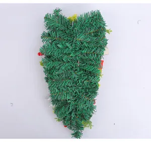 Artificial Christmas upside-down hanging tree with decorative red berries for door decor.