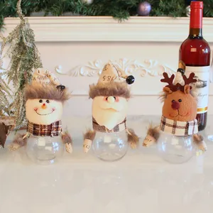 Juego festivo de 3 botes de dulces navideños con Papá Noel, renos y muñecos de nieve.