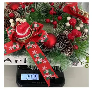 Detailed close-up view showing 243.5g weight of Christmas candle holder wreath ornament