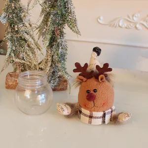 Tarro de caramelos de reno navideño con base de plástico transparente y peluche