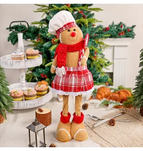 Festliche Weihnachts-Lebkuchenmann-Puppe mit Kochmütze und Karorock für Deko