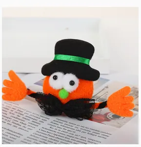 Detailed macro shot of a plush Halloween pumpkin slap bracelet with a black top hat.