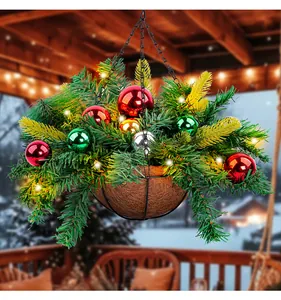 Detailed view of artificial Christmas hanging basket with ornaments and warm LED fairy lights