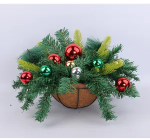 Artificial Christmas hanging basket with green pine needles and colorful ornaments