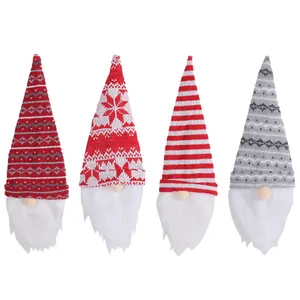 Set of 4 Christmas gnome wine bottle toppers with knitted hats for holiday table decor