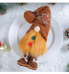 Detailed shot of Christmas gnome ornament with gingerbead patch on a white plate