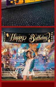 Decorative black and gold Happy Birthday banner displayed at a festive outdoor party