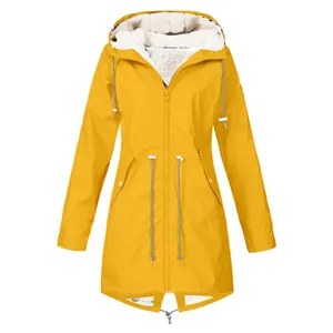 Women's yellow waterproof hooded jacket with warm fleece lining and adjustable drawstring waist detail