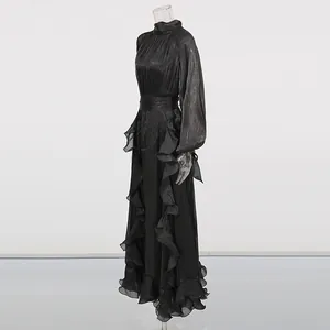 Detailed view of a black vintage court style maxi dress with ruffles and a stand collar.