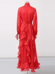 Elegant red vintage ruffled maxi dress with high neck and waist tie for a royal look