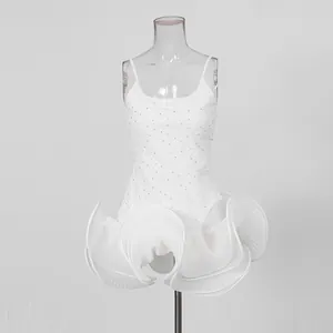 White French style camisole dress with rhinestones and dramatic pleated puff skirt detail.