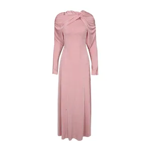 Front view of soft pink slim long sleeve dress with vintage twist shawl collar detail