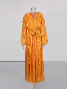 Elegant French style orange mercerized pleated maxi dress with ruffled V-neck and waist tie