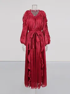 Elegant French style shiny red silk maxi dress with waisted tie and delicate ruffled details