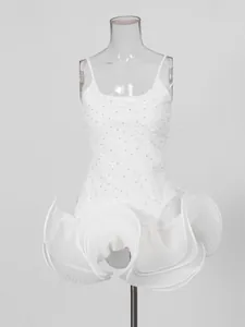 Elegant white sleeveless mini dress with rhinestones and pleated ruffled hem