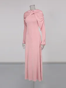 Soft pink elastic slim long-sleeve maxi dress with an elegant twist shawl collar.