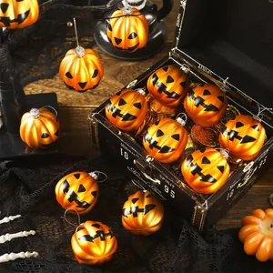 12-piece orange plastic Halloween pumpkin hanging balls in decorative chest scene