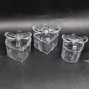 Set of three clear PS plastic wedding candy gift boxes with decorative bow lids