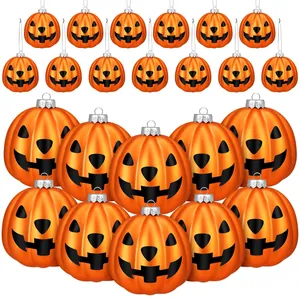 Set of 12 Halloween pumpkin ornaments with classic Jack-o'-lantern faces for festive decor.