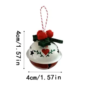 Campana navideña de metal en blanco y rojo con diseño de corazón y cordel para colgar