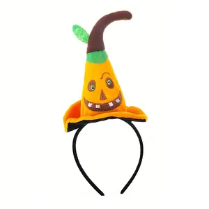 Close-up of plush orange witch hat headband with cute pumpkin face for Halloween