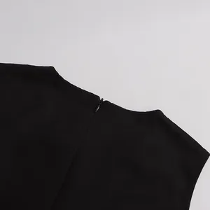 Detail view of the back neckline with a concealed zipper on a black sleeveless dress