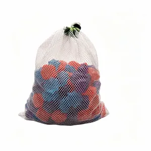 Reusable colorful plastic ice cubes in a white mesh bag for cocktails and party drinks