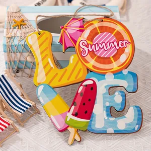 Detail of summer theme LOVE wooden hanging sign with watermelon and popsicle designs.