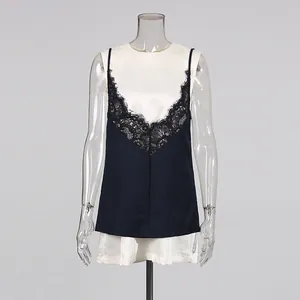 Elegante vestido corto sin mangas azul marino con encaje negro y detalle en blanco