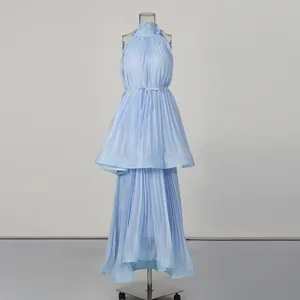 Detail showing elegant light blue pleated fabric on a high-neck sleeveless maxi dress.