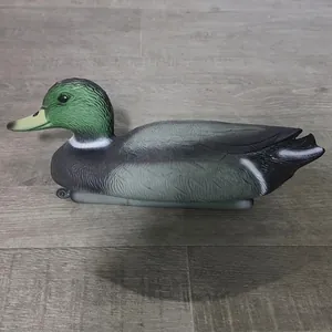 Realistic plastic mallard duck decoy for garden pond decoration, side profile detail