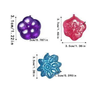 Set of reusable colorful flower-shaped plastic ice cubes with precise size measurements.
