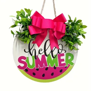 Detailed view of rustic wooden summer door sign with watermelon design and pink bow.