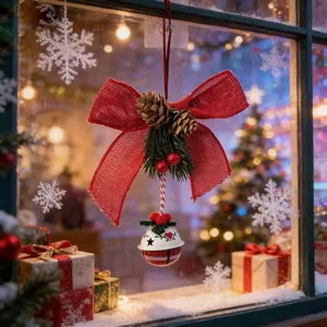 Festive Christmas jingle bell ornament with red burlap bow and pinecones hanging decor