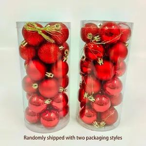 Set of 24 red Christmas tree ornaments featuring matte, shiny, and glitter finishes in a barrel