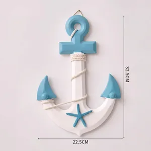 Mediterranean ocean style wooden anchor wall hanging with starfish and rope details for room.