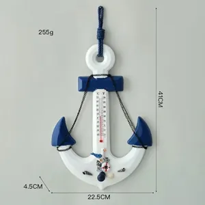 Mediterranean anchor wall decor with thermometer and nautical shell details