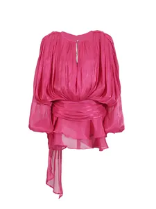 Elegant fuchsia pink long-sleeve mini dress with pleated waist and flowy ribbon detail