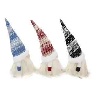 Set of three Christmas gnomes with knitted patterned hats and long white faux fur beards