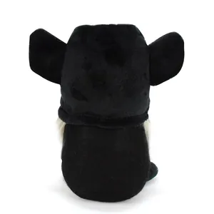 Back view of a black plush dog-themed gnome doll with cute floppy ears