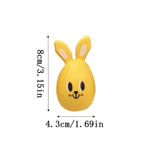 Yellow Easter bunny egg candy shell container showing 8cm height and 4.3cm width dimensions