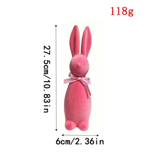 Pink flocked Easter bunny figurine for festive desktop decoration