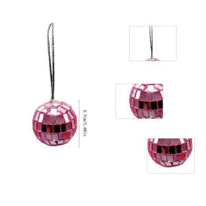 Detail view of a 2.7cm pink mirror disco ball ornament with close-up texture shots