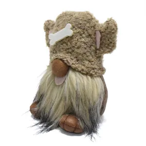 Detailed view of dog-themed gnome doll with fuzzy hat, dog ears, and bone accent.