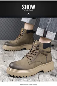 Vue détaillée de bottes de travail en cuir marron avec semelle en caoutchouc pour l'hiver